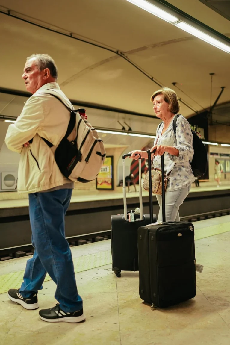 Senior traveling with luggage