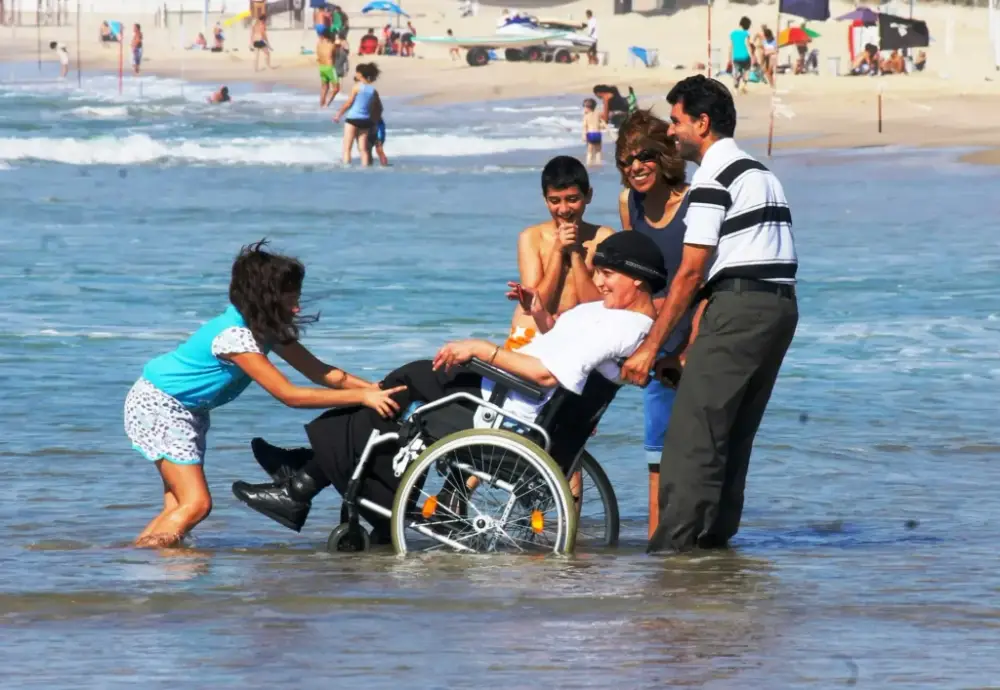 person in a wheelchair enjoying a trip personalized by an accessible travel planner.