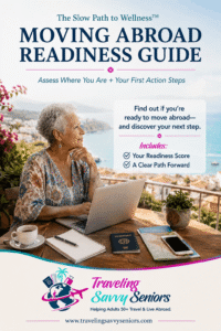 Moving Abroad Readiness Guide for adults 50+ planning to travel or live abroad, with readiness steps, a laptop, passport, and coastal view.